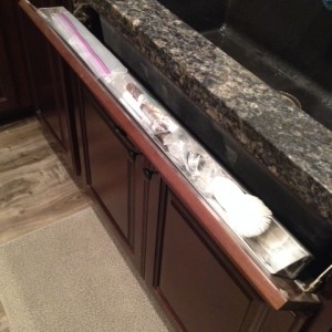 Flip down tray in front of kitchen sink
